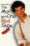 El hombre con un zapato rojo